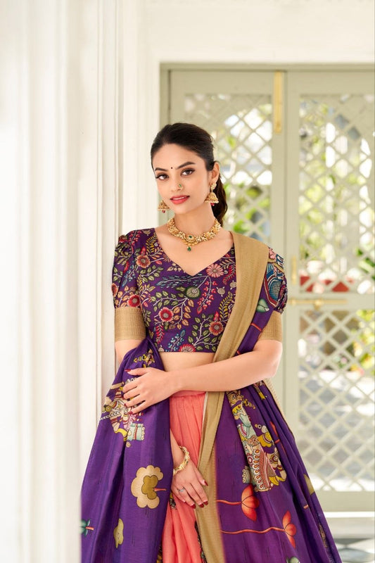 JAMKUDI-Adorned in the elegance of Dola Silk and the intricate charm of Kalamkari prints, the lehenga choli whispers tales of tradition and beauty