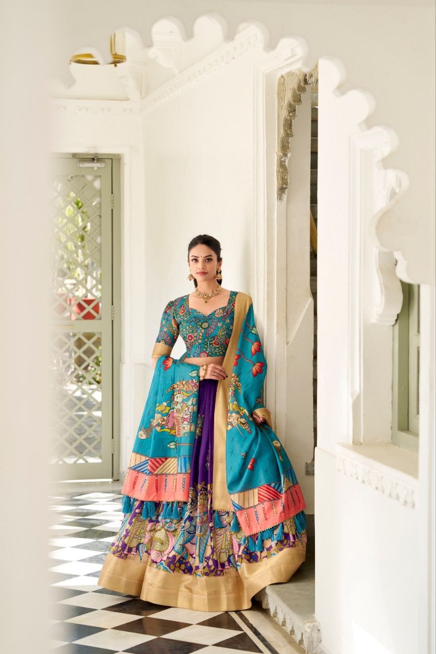 JAMKUDI-Adorned in the elegance of Dola Silk and the intricate charm of Kalamkari prints, the lehenga choli whispers tales of tradition and beauty