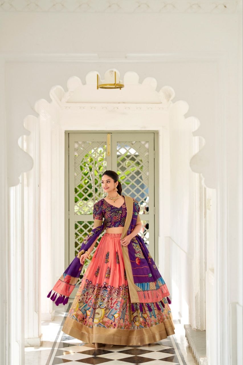 JAMKUDI-Adorned in the elegance of Dola Silk and the intricate charm of Kalamkari prints, the lehenga choli whispers tales of tradition and beauty