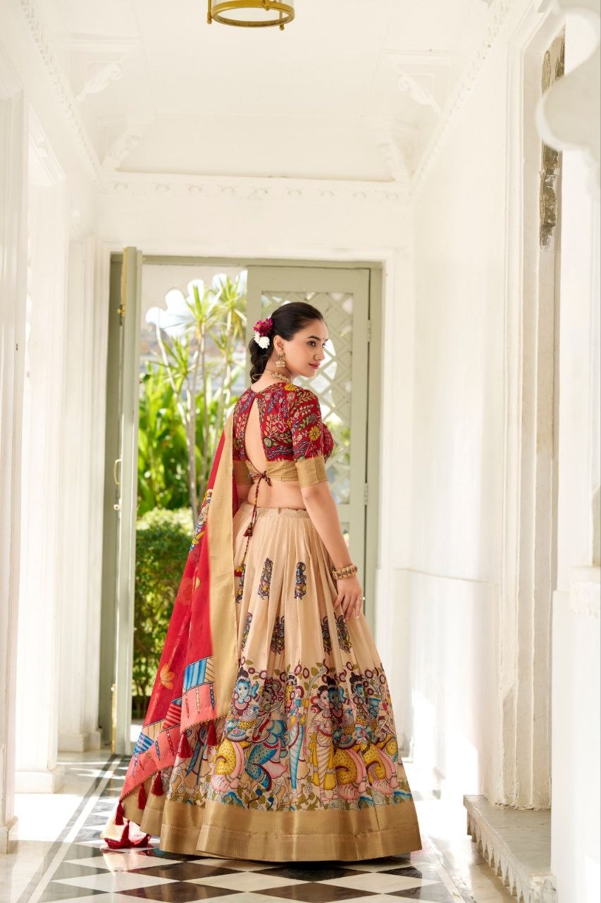JAMKUDI-Adorned in the elegance of Dola Silk and the intricate charm of Kalamkari prints, the lehenga choli whispers tales of tradition and beauty