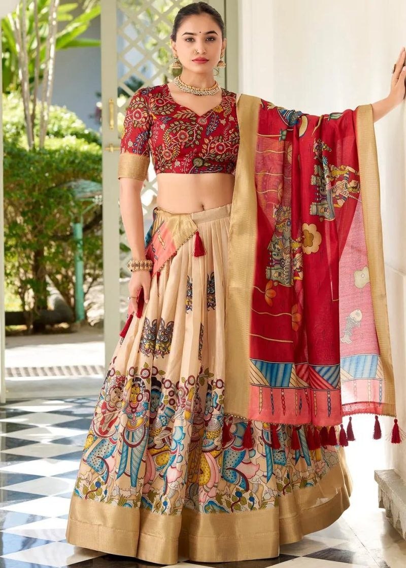 JAMKUDI-Adorned in the elegance of Dola Silk and the intricate charm of Kalamkari prints, the lehenga choli whispers tales of tradition and beauty