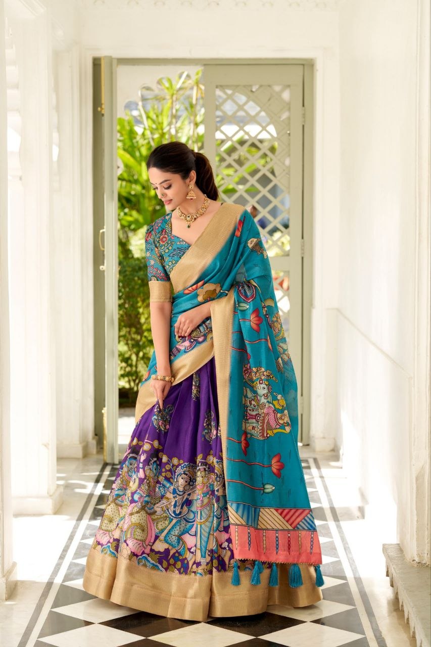 JAMKUDI-Adorned in the elegance of Dola Silk and the intricate charm of Kalamkari prints, the lehenga choli whispers tales of tradition and beauty